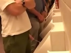 Pissing bro at the ballgame urinal